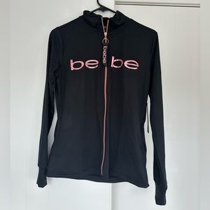 NWT Bebe Sport Black Zip-Up with Rosegold Detail - size small